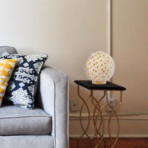 Stunning round white floral glass table lamp with a wooden base