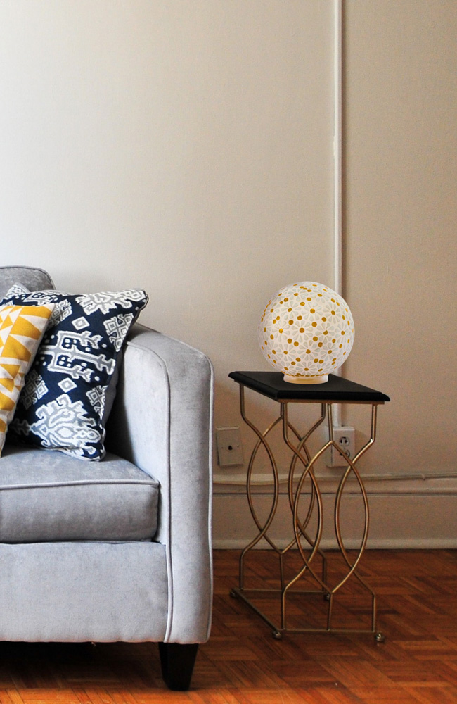 Stunning round white floral glass table lamp with a wooden base