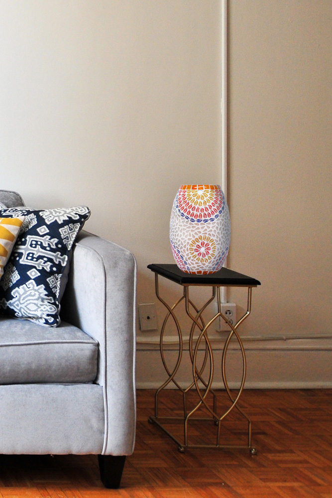Stunning oval white glass table lamp with yellow orange and blue design