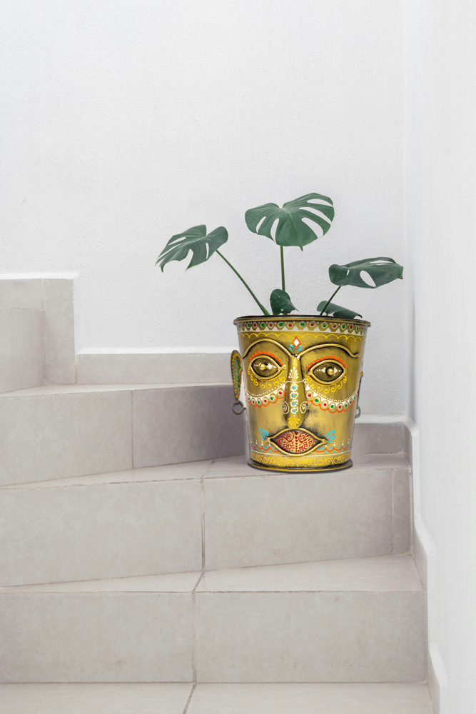 Iron face painted plant pot set of 2