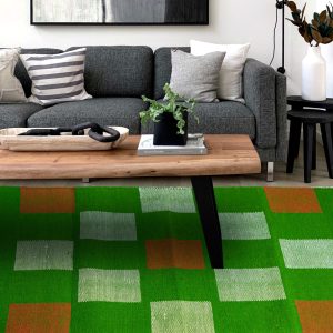 Green with white and red dhurrie for your living space